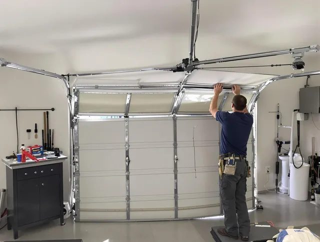 Melbourne Garage Door Repair specialist performing precise section replacement on Melbourne garage door